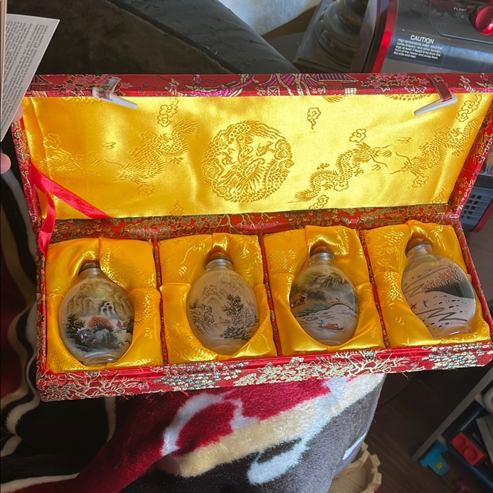 Set of Four Hand-Painted Snuff Bottles